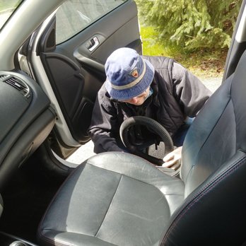 Biff's Automotive Detailing - Vacuuming all the crevices - Auto Detailing Near Me
