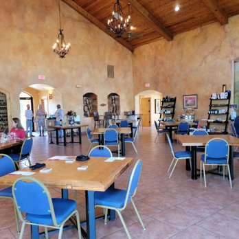Flat Creek Estate Winery & Vineyard - The indoor dining area, looking toward the entrance - Wineries Near Me - Marble Falls, Texas Flat Creek Estate Winery & Vineyard - The indoor dining area, looking toward the entrance - Wineries Near Me - Marble Falls, Texas