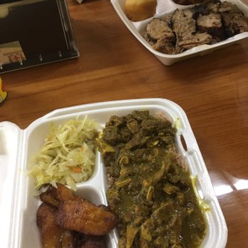 Mercy's Jamaican Kitchen - Back: jerk pork with rice and peas, plantains, dumpling. Front: goat curry with rice and peas, cabbage, plantains - Caribbean Near Me - Columbus, Georgia