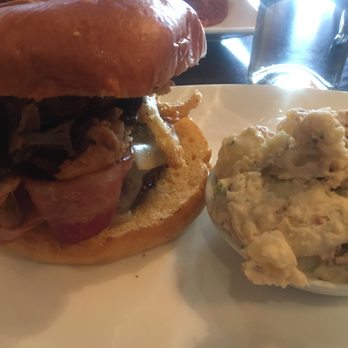 Root & Vine - Cheerwine BBQ Bacon Burger with Loaded Potato Salad - New American Near Me - Morganton, North Carolina Root & Vine - Cheerwine BBQ Bacon Burger with Loaded Potato Salad - New American Near Me - Morganton, North Carolina