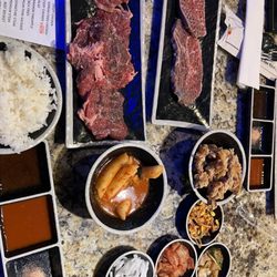 Wow Korean BBQ - First round of meats with Wow premium and Wow signature steak with Korean crispy chicken and tteokbokki with sides