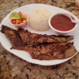 Combo #2 (carne asada); papusas not pictured. This was amazing! So flavorful and tender. Comes with 2 sides. Combo #2 (carne asada); papusas not pictured. This was amazing! So flavorful and tender. Comes with 2 sides.
