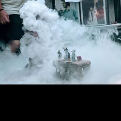 American Ice - Significant amounts of sublimated vapor emerging as a result of dry ice hitting water, falling around a D&D table.
