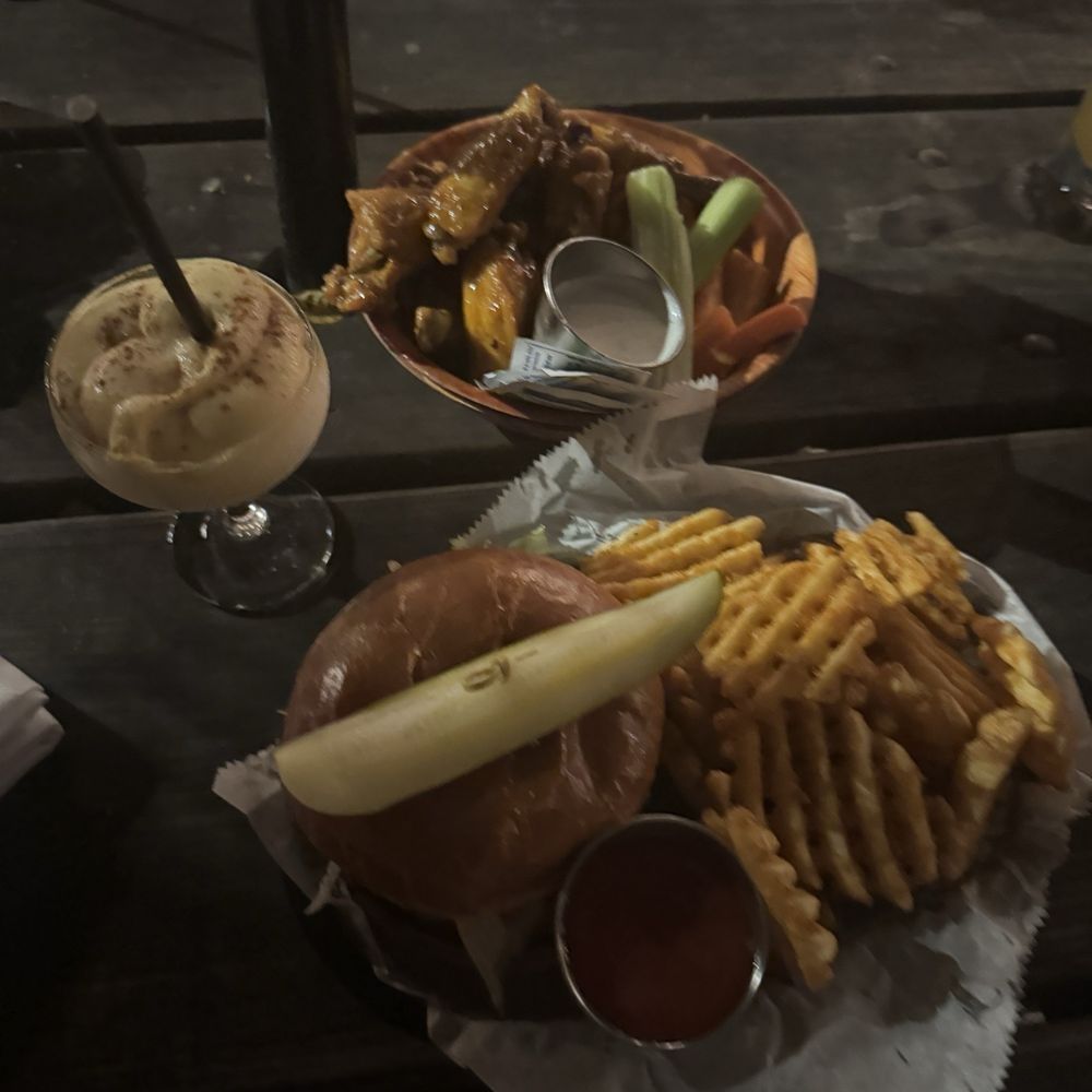 Falafel Burger, Waffle Fries, pumpkin spice slushie, and Dozen Wings Falafel Burger, Waffle Fries, pumpkin spice slushie, and Dozen Wings