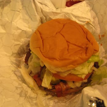 Burgerworx - Beef Burger on an Old Fashioned Burger Bun with swiss cheese, dill pickles, bacon, lettuce, tomato and ketchup. - Burgers Near Me - Asheville, North Carolina Burgerworx - Beef Burger on an Old Fashioned Burger Bun with swiss cheese, dill pickles, bacon, lettuce, tomato and ketchup. - Burgers Near Me - Asheville, North Carolina