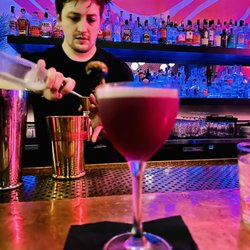 Pink Rabbit - Cam, our bartender, mixing cocktails