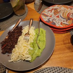 Chapulines with guacamole, cheese, and tortillas