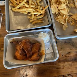 Wings, fries and chips with dip