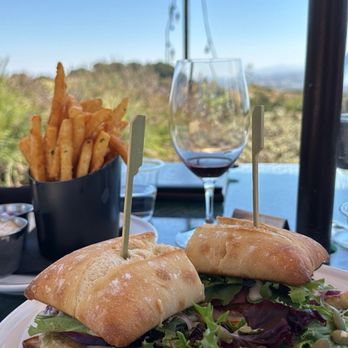 Calcareous Vineyard - Chicken and Jack Melt with Parmesan Fries in the background - Wine Tasting Room Near Me - Paso Robles, California Calcareous Vineyard - Chicken and Jack Melt with Parmesan Fries in the background - Wine Tasting Room Near Me - Paso Robles, California