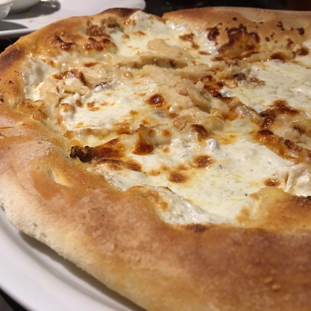 California Pizza Kitchen - Roasted garlic chicken - Pizza Near Me - Naples, Florida California Pizza Kitchen - Roasted garlic chicken - Pizza Near Me - Naples, Florida