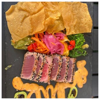 Portside Tavern - Sesame Crushed Ahi Tuna- citrus-soy glaze, seaweed salad, sriracha aioli, pickled veggies, wasabi paste and wonton chips. - Seafood Near Me - Bristol, Rhode Island Portside Tavern - Sesame Crushed Ahi Tuna- citrus-soy glaze, seaweed salad, sriracha aioli, pickled veggies, wasabi paste and wonton chips. - Seafood Near Me - Bristol, Rhode Island