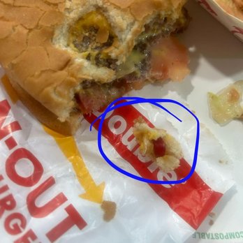 In-N-Out Burger - finger nail in burger bun - Burgers Near Me - Orange, California