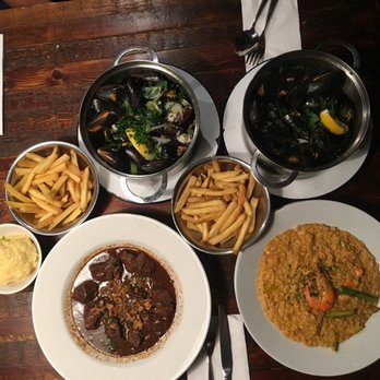 Belgo Centraal - Traditional mussels, Thai mussels, King prawn risotto, ox cheeks and mash - Belgian Near Me - London, XGL Belgo Centraal - Traditional mussels, Thai mussels, King prawn risotto, ox cheeks and mash - Belgian Near Me - London, XGL