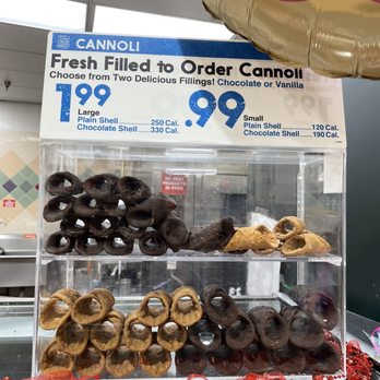 Harris Teeter - a display of doughnuts for sale - Grocery Near Me - Cary, North Carolina