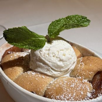 Georgia James - Peach cobbler. I enjoyed the homemade dough ball take on this popular dessert. - Steakhouses Near Me - Houston, Texas
