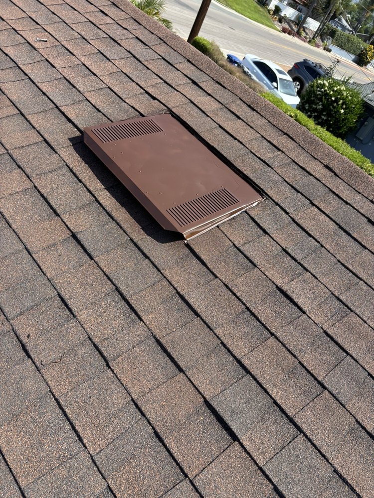 Slide of Vigil's Roofing