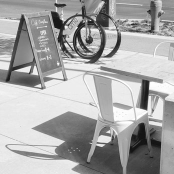 Cafe Overflow - a bicycle parked on the sidewalk - Coffee & Tea Near Me - North Vancouver, British Columbia Cafe Overflow - a bicycle parked on the sidewalk - Coffee & Tea Near Me - North Vancouver, British Columbia