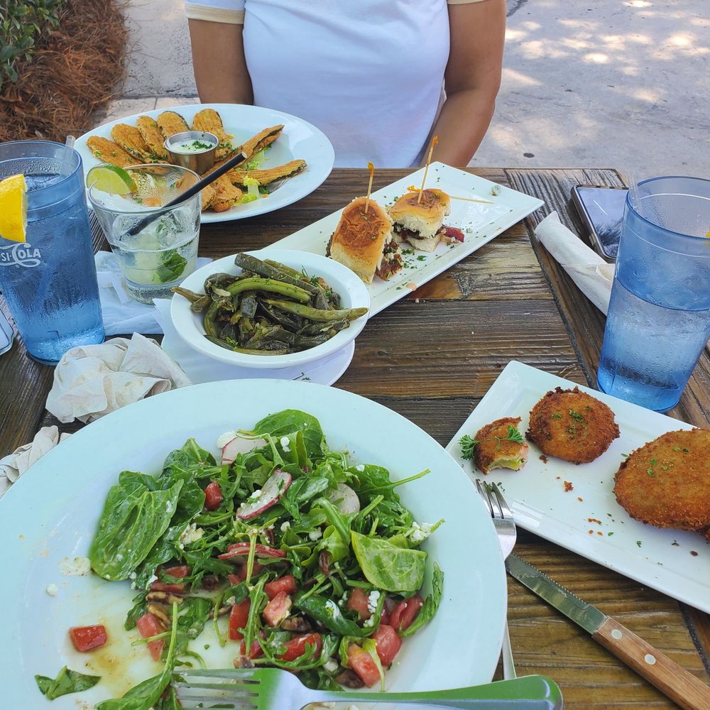 Rustic Table - Fried pickles, blue burgers, fried green tomatoes and a steak salad Drink - Carolina cucumber vodka - Southern Near Me - Pawleys Island, South Carolina