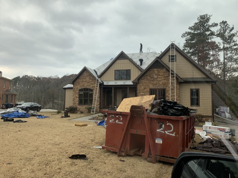 Slide of Noland Roofing