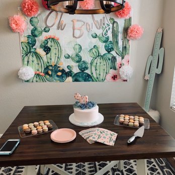 Azucar Bakery - a table with a cake and desserts - Bakeries Near Me - Denver, Colorado