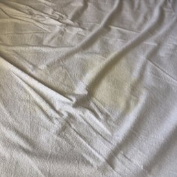 Piss stains on the mattress cover