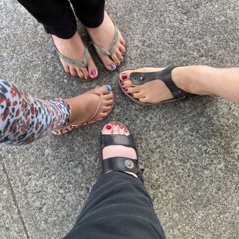 Ascend Nail Lounge - All four of us showing off our pretty toes! - Nail Salons Near Me - Seattle, Washington