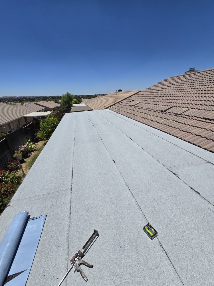 Slide of Eminent Roofing