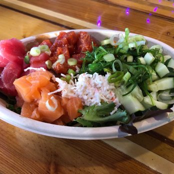 Poke Fin - Mixed greens, salmon, tuna, spicy tuna and added toppings - Poke Near Me - Cocoa Beach, Florida