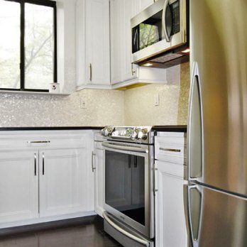 Distinctive Custom Renovation - stainless steel refrigerator and microwave - General Contractors Near Me - Hoboken, New Jersey Distinctive Custom Renovation - stainless steel refrigerator and microwave - General Contractors Near Me - Hoboken, New Jersey
