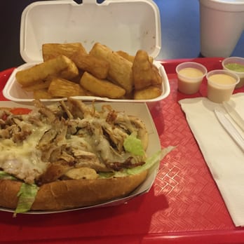 El Pollo Sabroso - Chicken sandwich with yucca fries, green and white sauce - Latin American Near Me - Washington, DC, District of Columbia