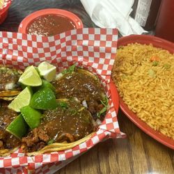 Sergio's Mexican Taqueria - Tacos Al pastor with extra limes and red sauce, side of rice