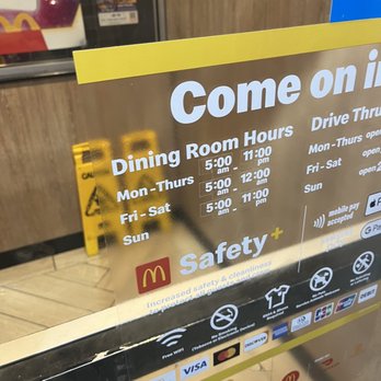 McDonald's - a sign in the window of a restaurant - Fast Food Near Me - Greensburg, Indiana