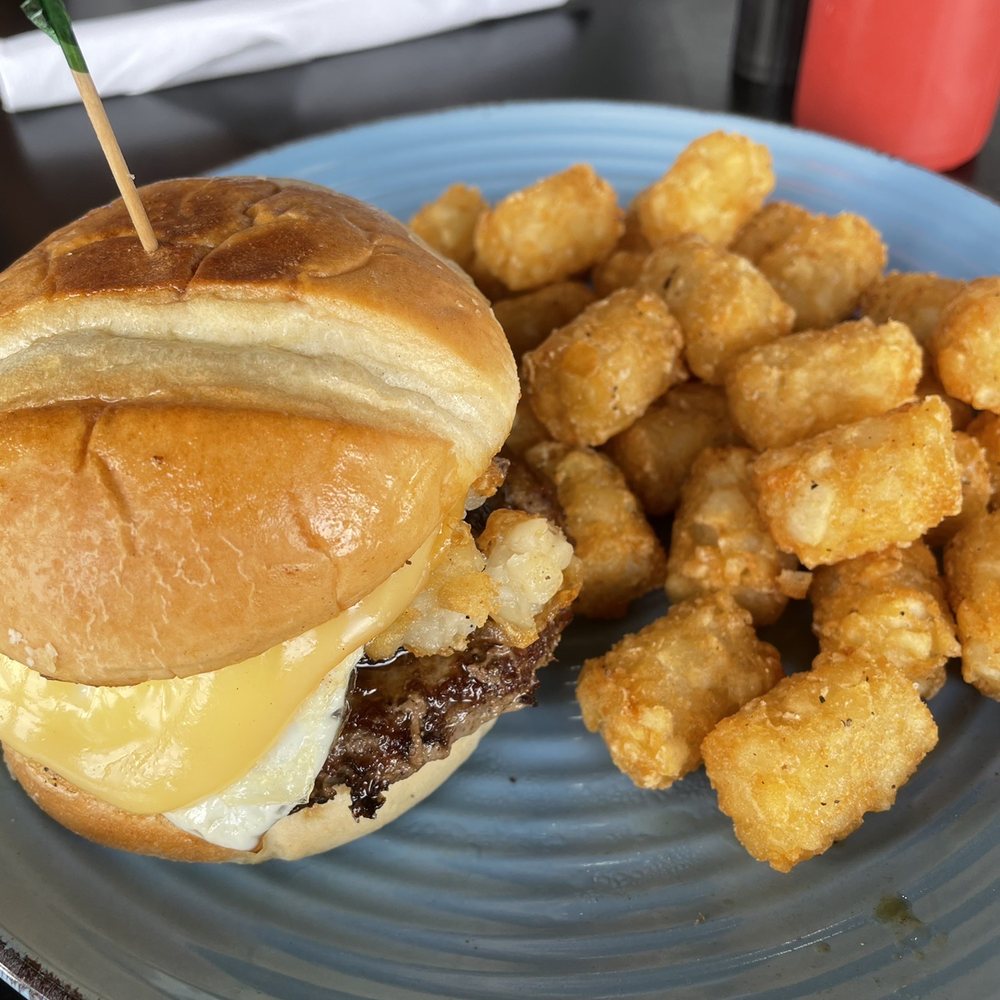 Millstone Biscuit - The burger with the fried egg and tots - Breakfast & Brunch Near Me - Murrells Inlet, South Carolina Millstone Biscuit - The burger with the fried egg and tots - Breakfast & Brunch Near Me - Murrells Inlet, South Carolina