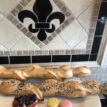 Le Petit Paris - French Bakery - Epi french bread, fruit tartlet and lemon and raspberry macarons. Apricot flavor didn't make it home. Sooo delicious! - Bakeries Near Me - Omaha, Nebraska