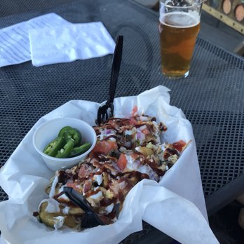 The Casual Pint - Central Phoenix - Loaded potato twists with pulled pork on top...BOMB! - Beer Bar Near Me - Phoenix, Arizona The Casual Pint - Central Phoenix - Loaded potato twists with pulled pork on top...BOMB! - Beer Bar Near Me - Phoenix, Arizona