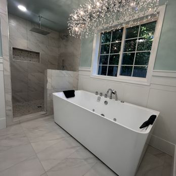 New Heights Development - Soaking tub under new window - This was a huge primary bathroom remodel. - General Contractors Near Me - Roy, Washington New Heights Development - Soaking tub under new window - This was a huge primary bathroom remodel. - General Contractors Near Me - Roy, Washington
