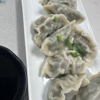 Bo’s Kitchen - house pork dumplings- yes!! With chives and home made fresh - Chicken Wings Near Me - Honolulu, Hawaii