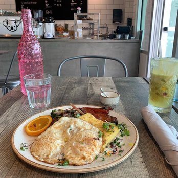 The Aussie Grind - Breakfast mushrooms w/ eggs, candied bacon and Brisbane juice - Cafes Near Me - Frisco, Texas