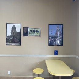 a yellow table and yellow stools