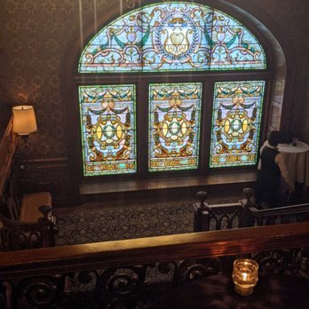The Ghost Bar - a stained glass window in a bar - New American Near Me - Detroit, Michigan