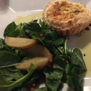 Huhu Cafe - Caramelized garlic, goat feta & thyme tart with rocket, pear & honey walnut salad - Coffee & Tea Near Me - Hangatiki, WKO Huhu Cafe - Caramelized garlic, goat feta & thyme tart with rocket, pear & honey walnut salad - Coffee & Tea Near Me - Hangatiki, WKO