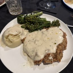 Chicken Fried Ribeye Steak, creamy mash potatoes and broccolini Chicken Fried Ribeye Steak, creamy mash potatoes and broccolini