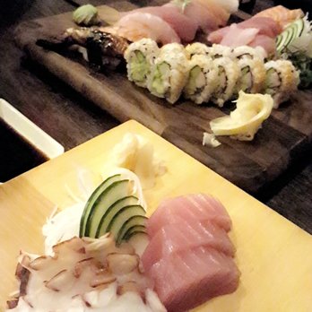 Sushimoto - Tuna and octopus sashimi (left) and sushi and sashimi combo platter (eel, shrimp, tuna, tilapia, salmon, yellowtail, California roll) - Sushi Bars Near Me - Miramar Beach, Florida