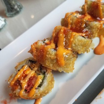 Tokyo Seoul - Cougar roll - salmon, crab, spicy tuna, and avocado deep fried with spicy sauce on top. Delicious and fun! - Japanese Near Me - Pullman, Washington