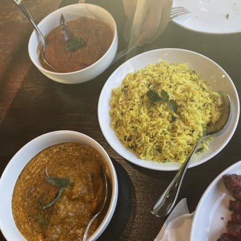 Indian Paradise - 161. Lamb Roganjosh (top left) 154. Lamb Korma (bottom right) Turmeric Rice - Indian Near Me - Chicago, Illinois Indian Paradise - 161. Lamb Roganjosh (top left) 154. Lamb Korma (bottom right) Turmeric Rice - Indian Near Me - Chicago, Illinois