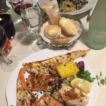 Taverna San Trovaso - Seafood plate and Spaghetti Vongole. Both perfectly and deliciously made. - Italian Near Me - Venezia, VE Taverna San Trovaso - Seafood plate and Spaghetti Vongole. Both perfectly and deliciously made. - Italian Near Me - Venezia, VE