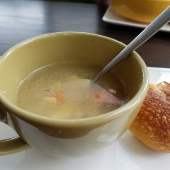 Panera Bread - Photo of the bowl of chicken noodle soup I ordered, served in a cup, half filled.  Worst Panera ever! No offer to make it right.Go elsewhere - Sandwiches Near Me - Riverside, California