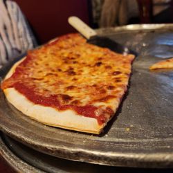 Cryan's Tavern - Store brand frozen pizza crust. At least they took the cardboard off the bottom. I think, anyway. Hard to tell.