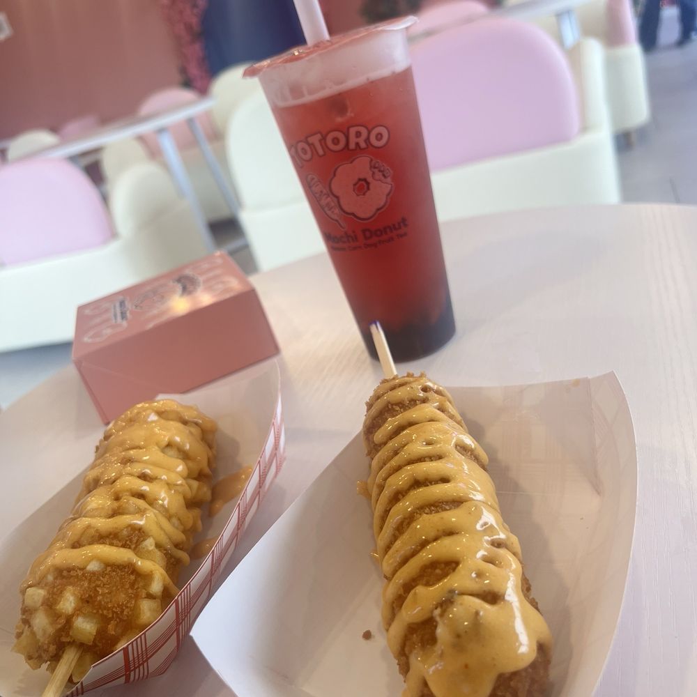 Potato Dog, Totoro Dog, Red Velvet donut, and Strawberry fruit tea with boba Potato Dog, Totoro Dog, Red Velvet donut, and Strawberry fruit tea with boba