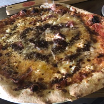 Trapezium Brewing - Pizza with Red Sauce, Prosciutto, Fig, Honey Drizzle and Feta - Pizza Near Me - Petersburg, Virginia Trapezium Brewing - Pizza with Red Sauce, Prosciutto, Fig, Honey Drizzle and Feta - Pizza Near Me - Petersburg, Virginia